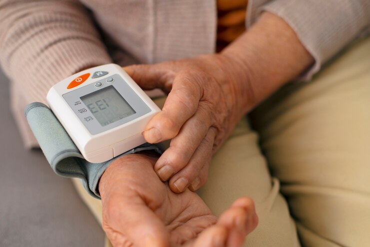 older person checking their blood pressure with tensiometer 23 2150456114