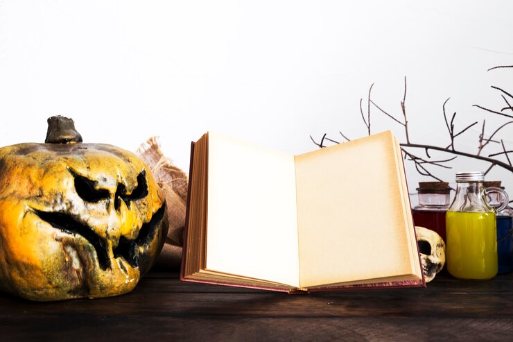 Mengenal Halloween, Perayaan 31 Oktober yang Identik dengan Hantu dan Tradisi Menarik 2 opened book spooky pumpkin table 23 2147905776