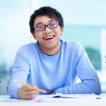 Tips Ampuh Agar Pelajaran Cepat Nempel di Kepala 8 student sitting desk with books table