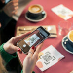 QRIS : Solusi Pembayaran Praktis Generasi MIllenial 3 high angle woman scanning qr code