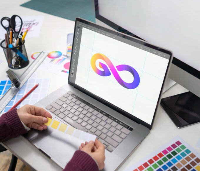 young female designer working her laptop