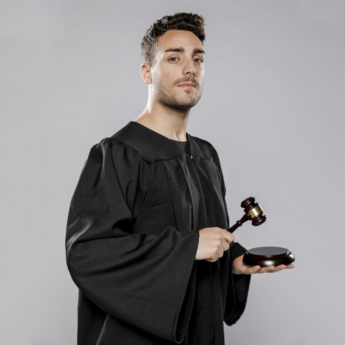 side view male judge with gavel