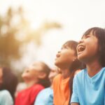Senyum Sehat: 5 Keajaiban Tertawa untuk Kesehatan Fisik dan Mental Anda 3 20230814092637 fpdl.in group kids friend laughing together 1150 3911 large