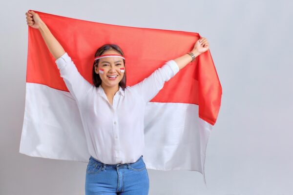 20230818091243 fpdl.in happy young asian women celebrate indonesian independence day holding indonesian flag isolated white background 512242 4283 large