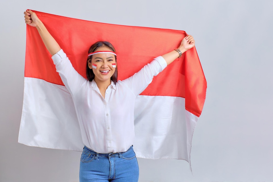 20230818091243 fpdl.in happy young asian women celebrate indonesian independence day holding indonesian flag isolated white background 512242 4283 large