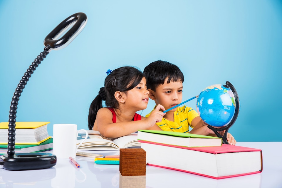 Mengenal Bakat 10 Tanda Anak Cerdas yang Terlihat Sejak Dini 1 20230830053524 fpdl.in cute little indian asian kids studying study table with pile books educational globe isolated light blue colour 466689 13515 large