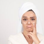 Kulit Kamu Kusam dan Ingin Kulit Glowing? 5 Tips Ini Bisa Kamu Lakukan Di Rumah 9 beautiful young woman white bathrobe posing white wall 114579 28009