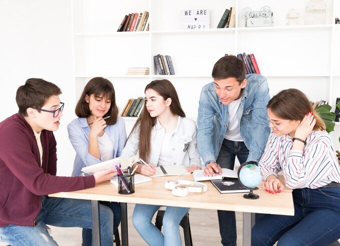 students desk working together 23 2148166344