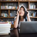 Strategi Efektif untuk Meningkatkan Fokus Belajar di Sekolah 5 young woman reading book sitting indoor urban cafe 1150 3982