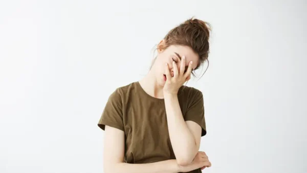 015824700 1623810700 portrait displeased bored tired woman with bun