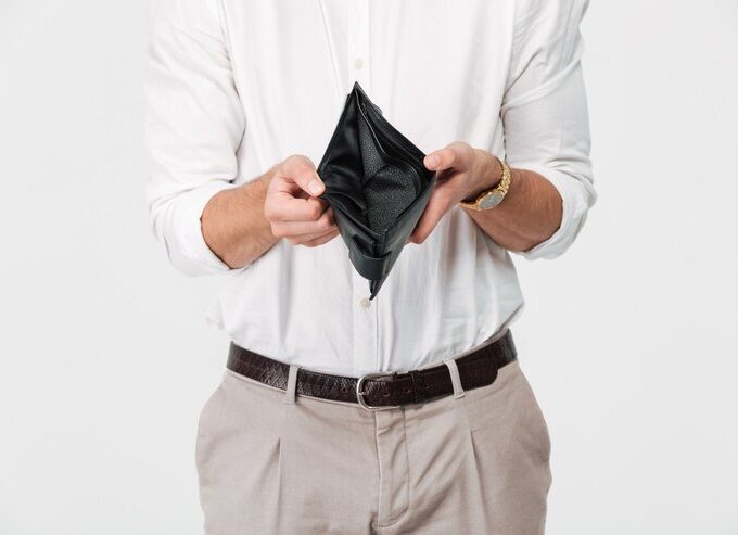 close up portrait man showing empty wallet 171337 17551