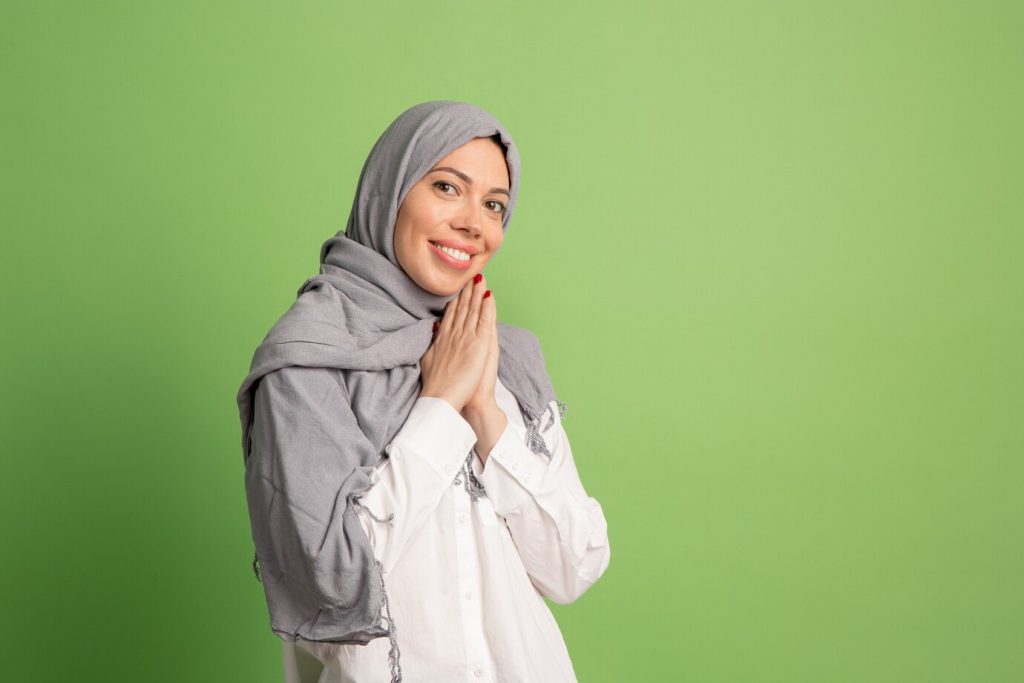 happy arab woman hijab portrait smiling girl posing green studio 155003 28150